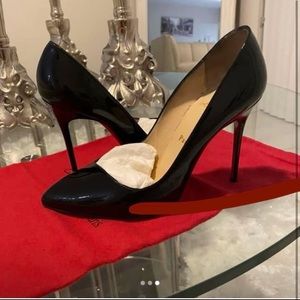 Used Christian Louboutin / Red Bottoms